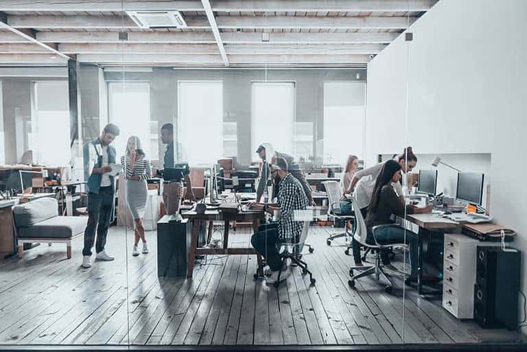 team of office workers at computers