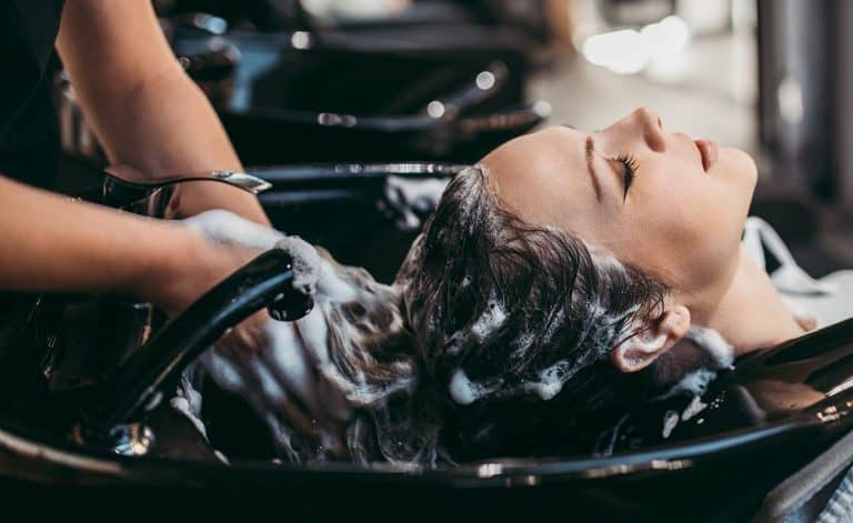 woman getting her hair washed in the salon